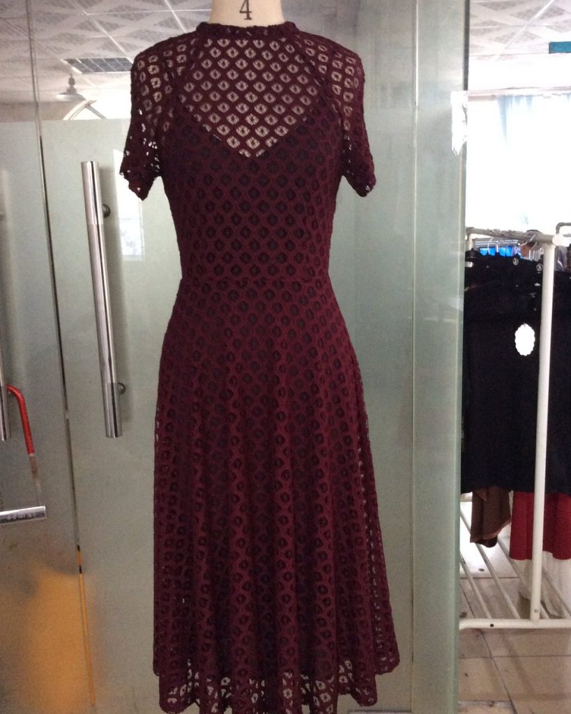 Women's lace cut-out dress with slip